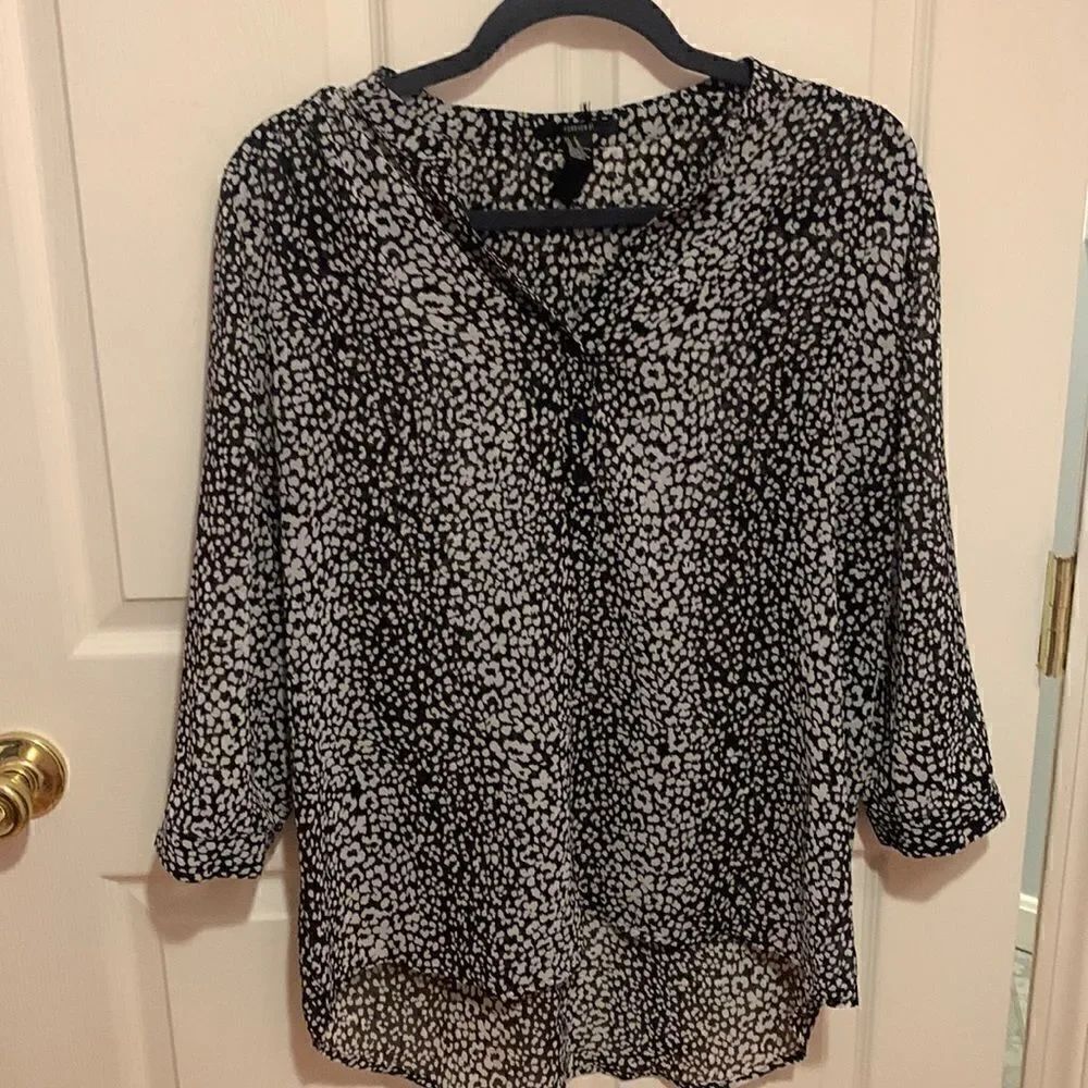 GUC black and white light blouse. Material is see through size M